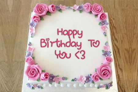 Write a greeting on the birthday cake roses