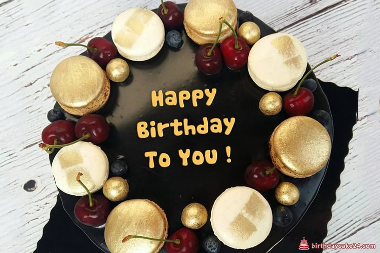 Luxurious gilded chocolate birthday cake with name edited